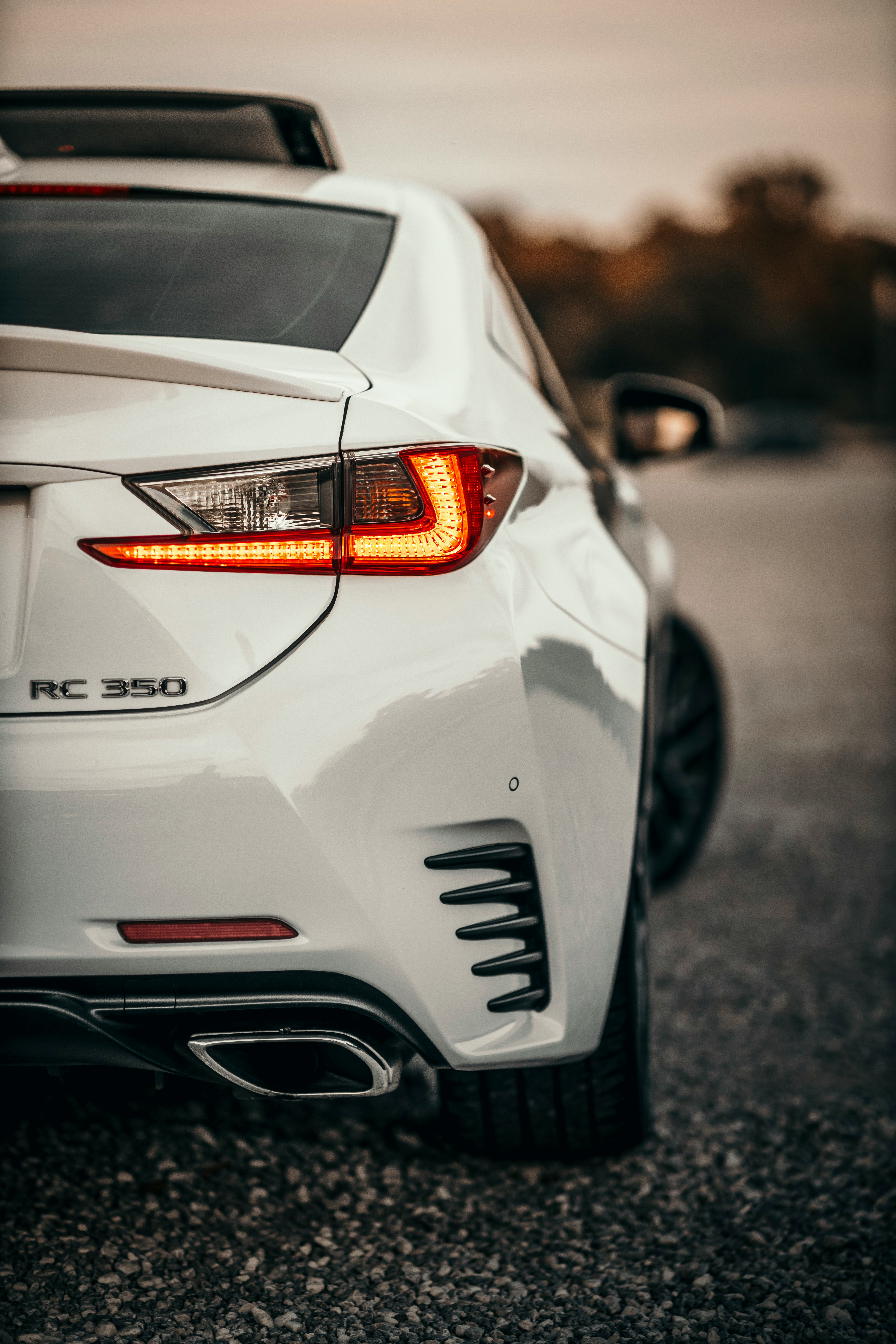 white and black car on road during daytime